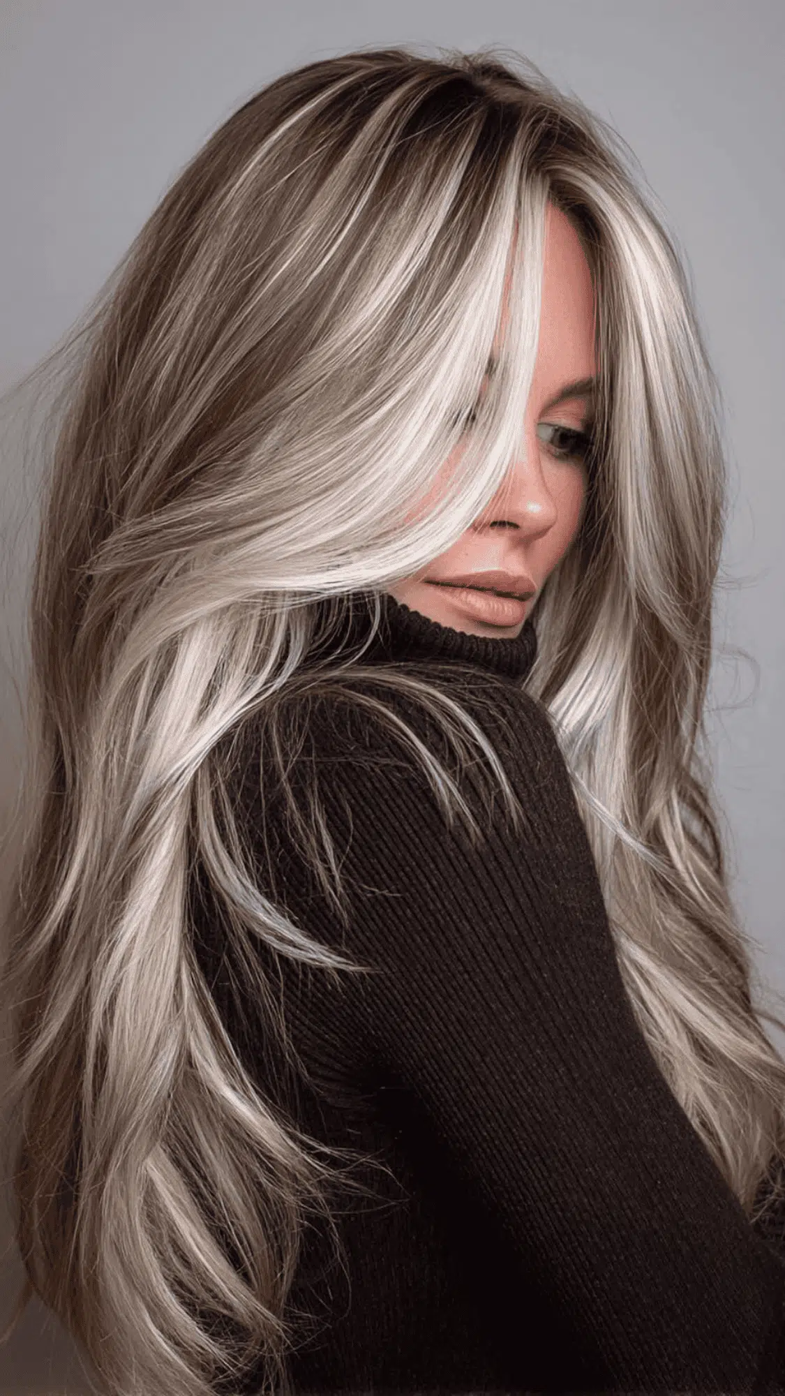 wavy brown hair with silver ribbons