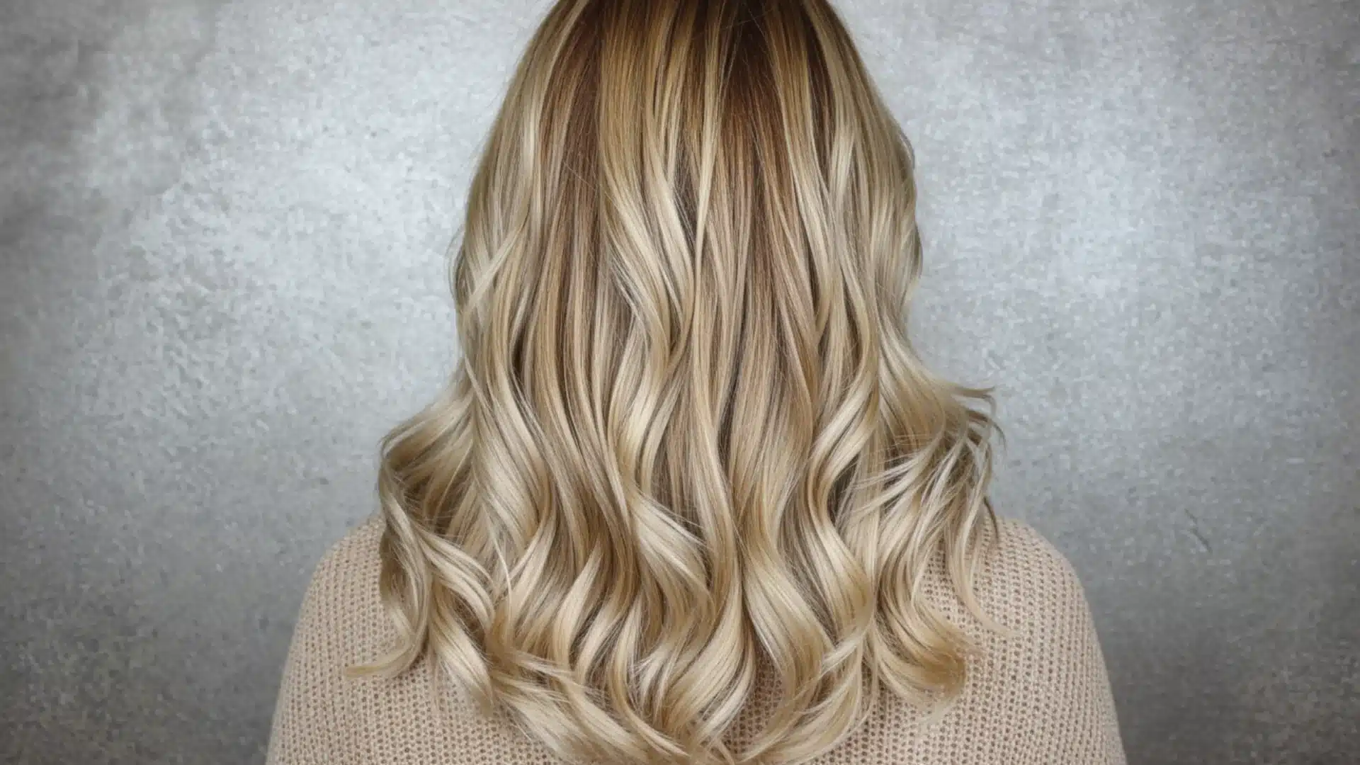 Back view of blonde hair with ultra-fine baby lights adding subtle shine and natural-looking dimension