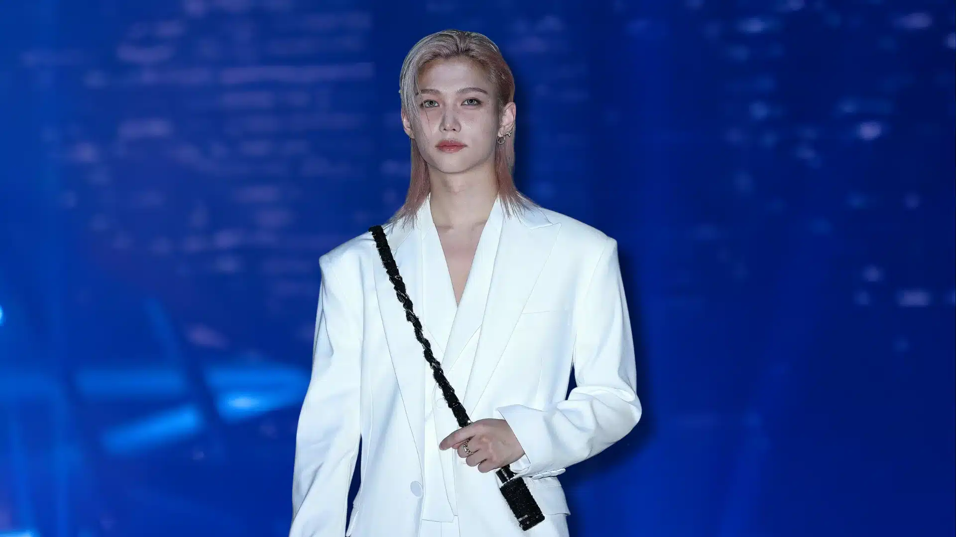 Felix of Stray Kids wearing a platinum mullet at a global fashion event