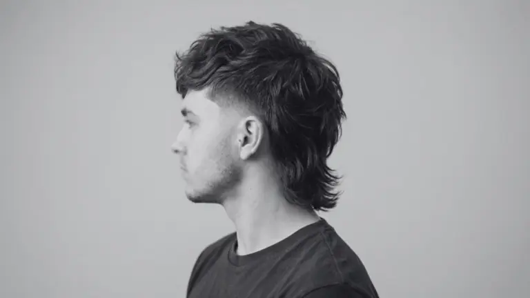 Side profile modern mullet haircut showing why mullets are still popular in 2026