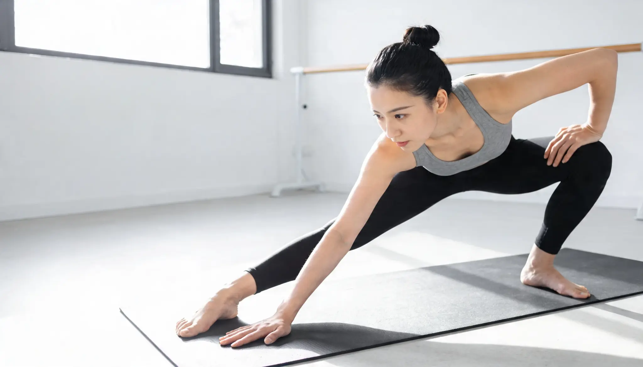 Individual performing mobility exercises to improve flexibility and joint movement