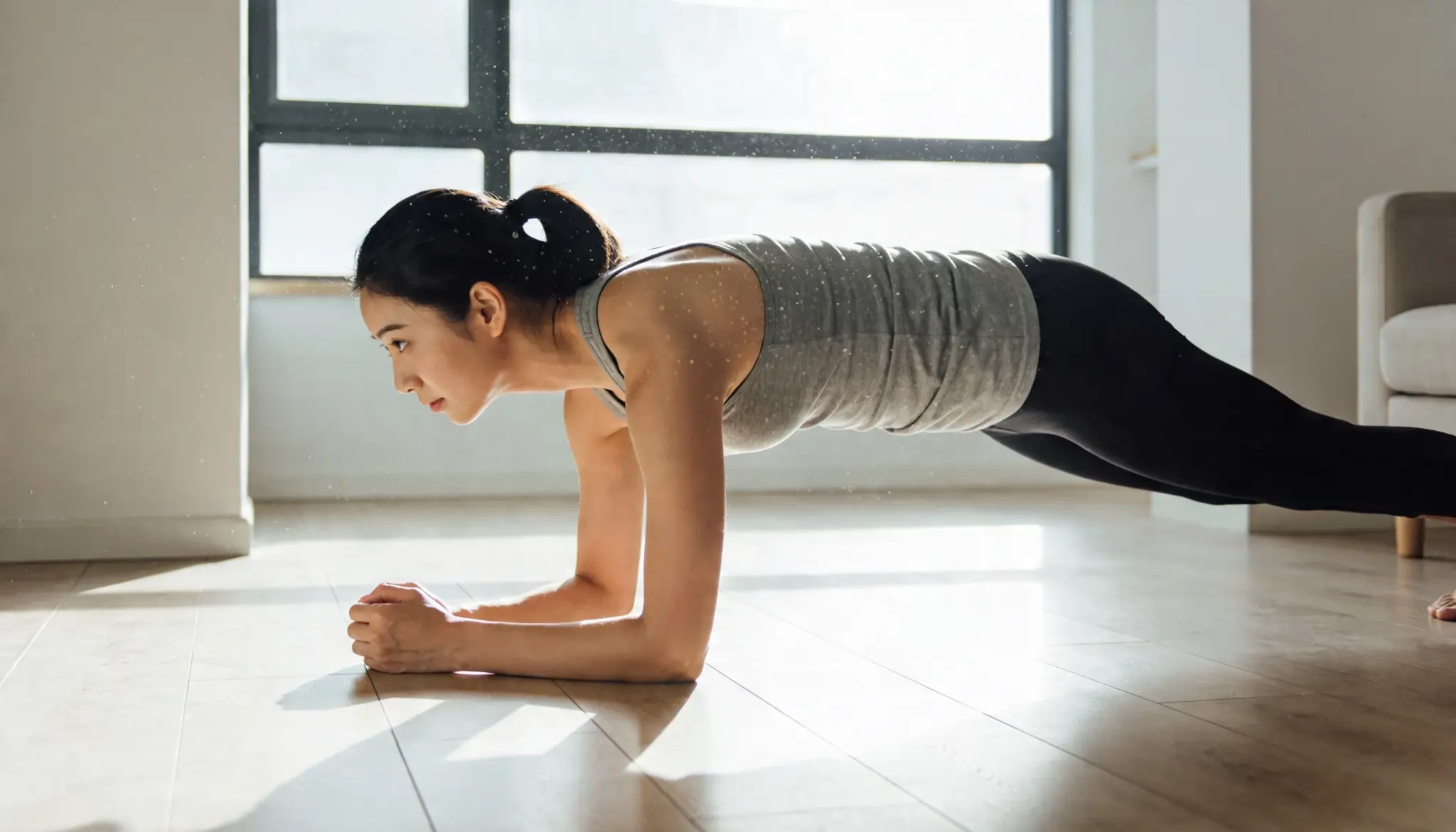 Person doing bodyweight exercises like push ups in a simple home environment